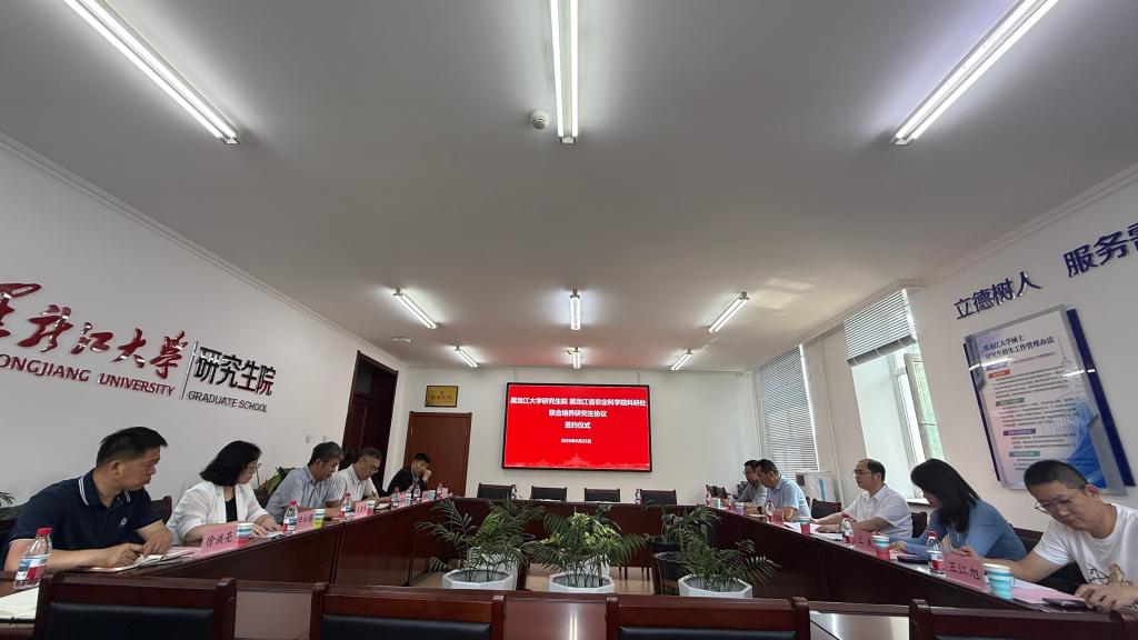 农科院科研处处长何鑫淼一行